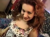 Sensual redhead Marisella teases and toys her pussy