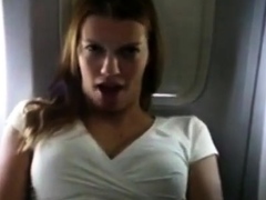 Girl is getting wet in private plane