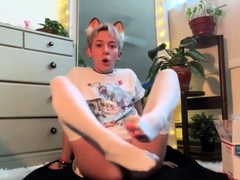 Blonde teen in solo action with her pussy